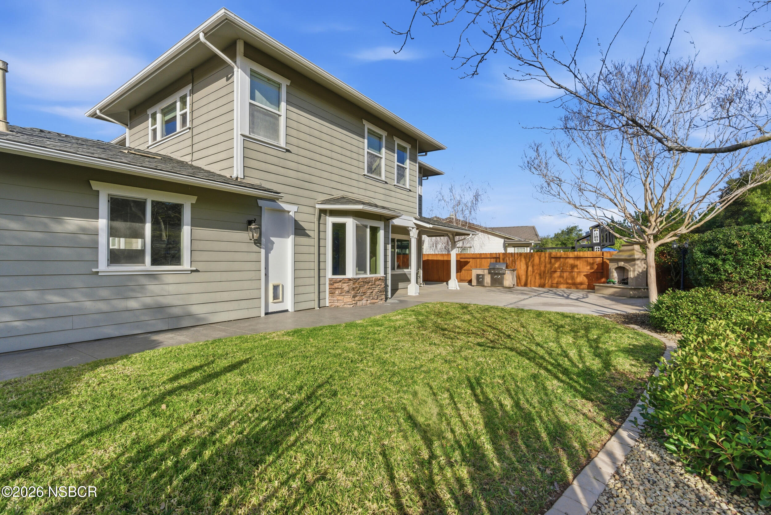 5632 Menemsha Lane Santa Maria, CA 93455 - Photo 46 of 66 a front view of a house with a garden