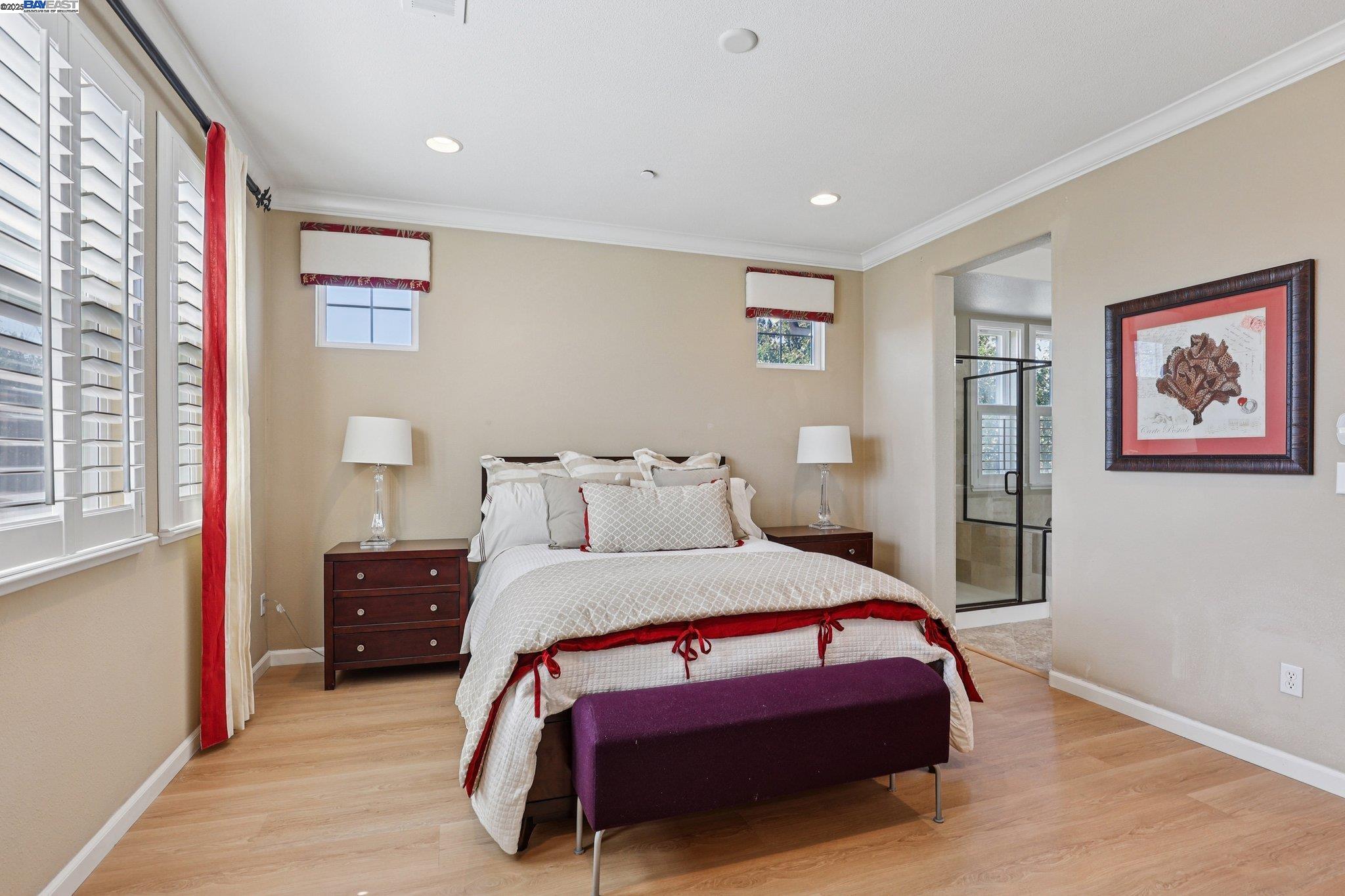 622 Moss Way Hayward, CA 94541 - Photo 21 of 25 a bedroom with a bed and a painting on the wall