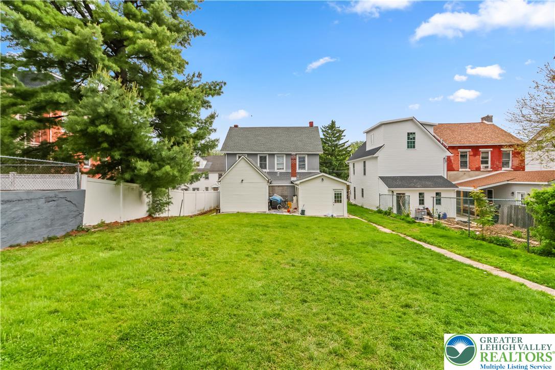 12 South Front Street Coplay, PA 18037 - Photo 2 of 41 Expansive green space provides a perfect setting for outdoor enjoyment.