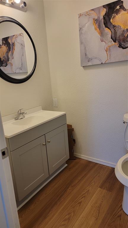 2001 East Alma Avenue Sherman, TX 75090 - Photo 15 of 16 a bathroom with a sink and a mirror
