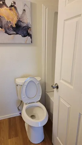 a bathroom with a toilet and a sink