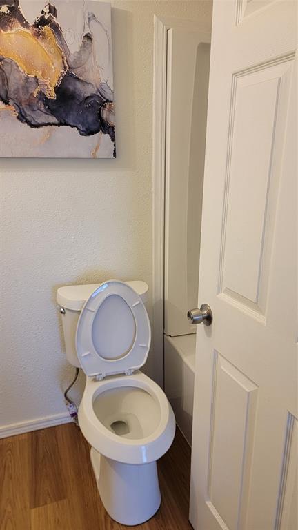 2001 East Alma Avenue Sherman, TX 75090 - Photo 16 of 16 a bathroom with a toilet and a sink