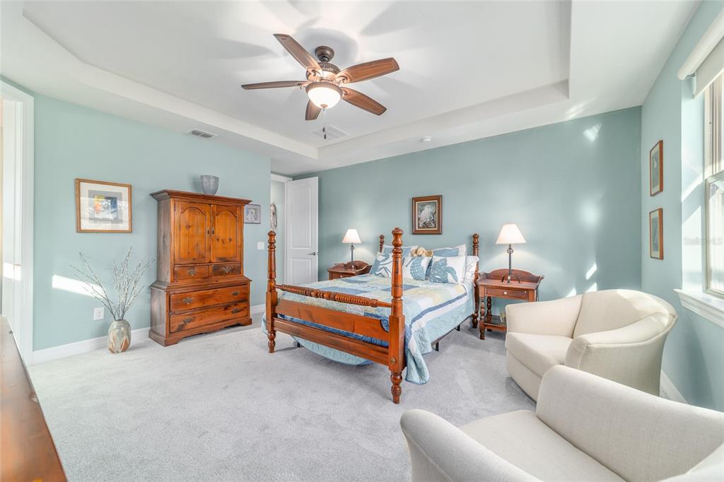 10106 Southwest 77th Loop Ocala, FL 34481 - Photo 31 of 69 a bedroom with furniture and window