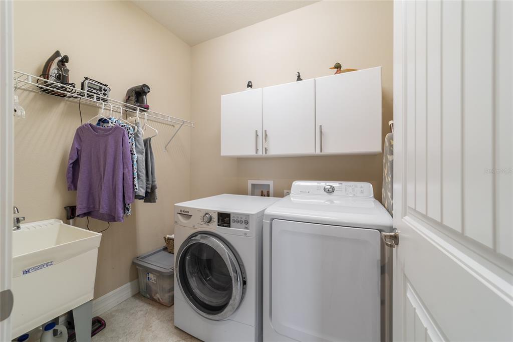 10106 Southwest 77th Loop Ocala, FL 34481 - Photo 43 of 69 a utility room with dryer and washer