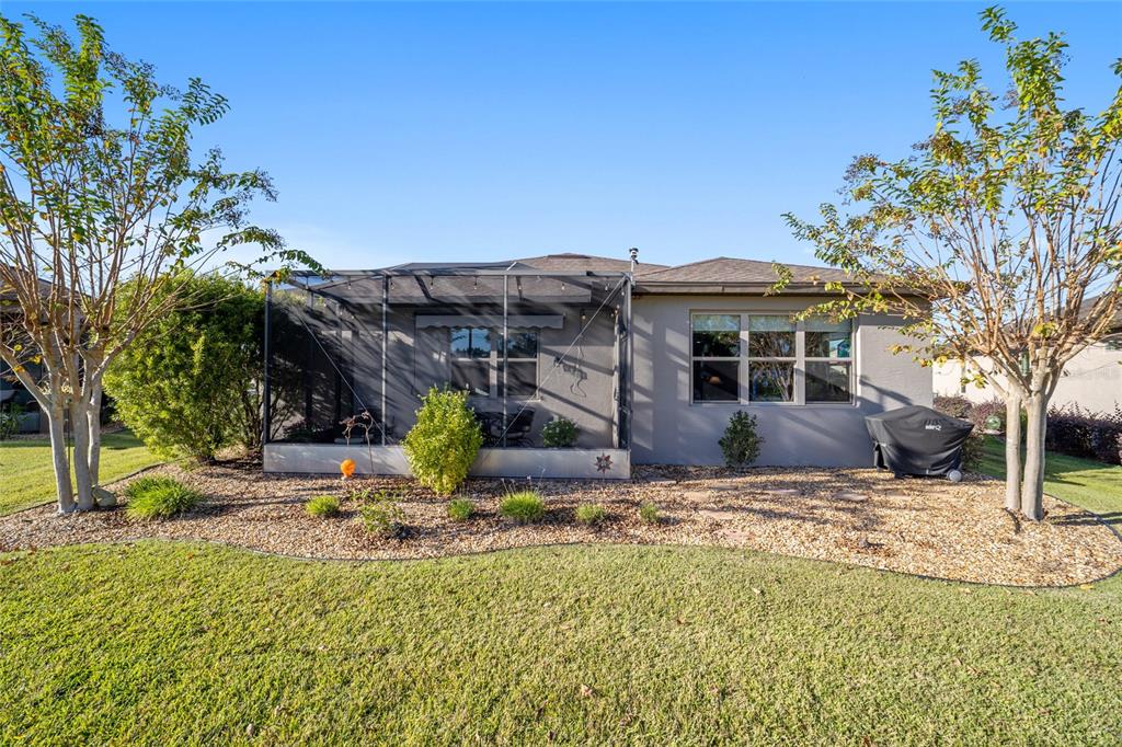 10106 Southwest 77th Loop Ocala, FL 34481 - Photo 49 of 69 a view of a house with a yard