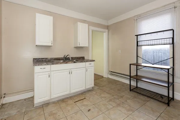 a view of cabinets and window