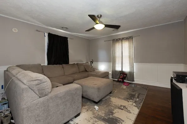 a living room with furniture and a couch