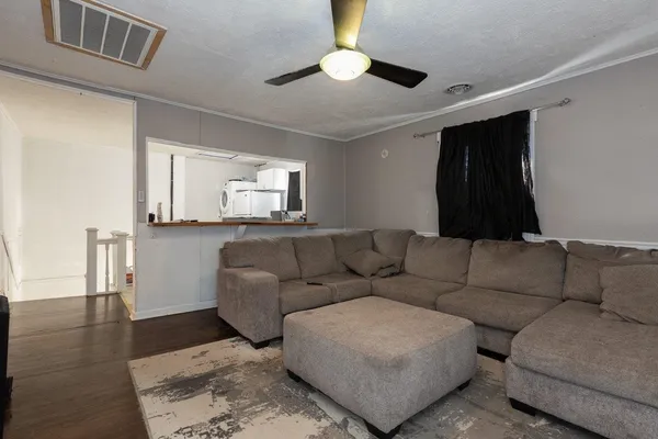 a kitchen with a sink and a stove top oven