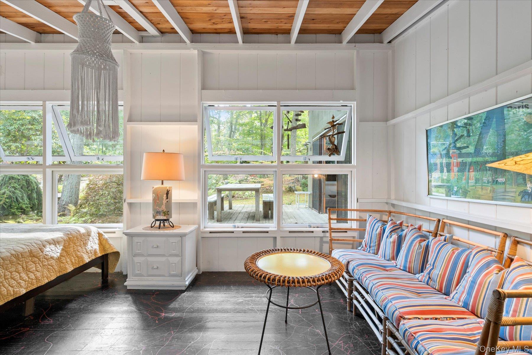46 Flaggy Hole Road East Hampton, NY 11937 - Photo 15 of 32 a living room with furniture and a large window