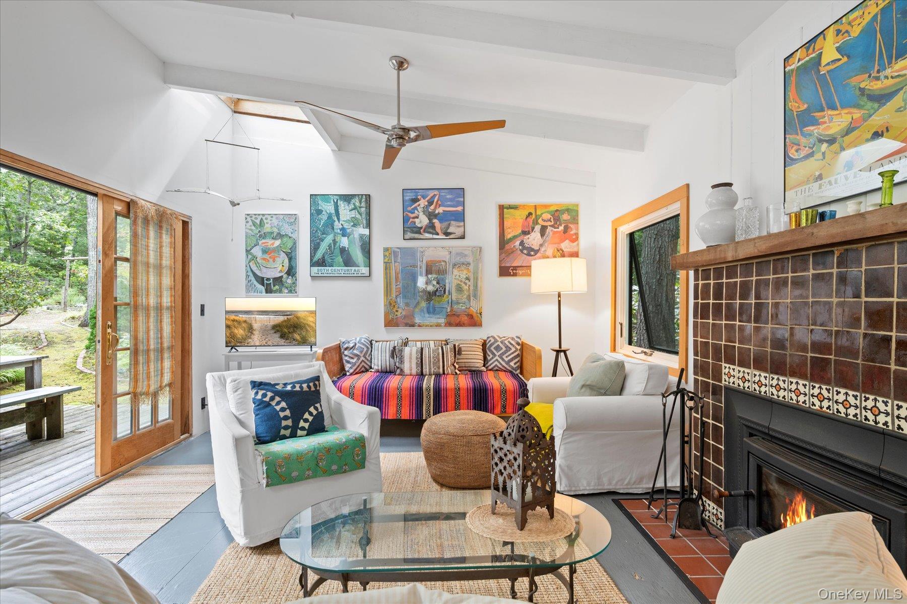 46 Flaggy Hole Road East Hampton, NY 11937 - Photo 3 of 32 a living room with furniture and a large window