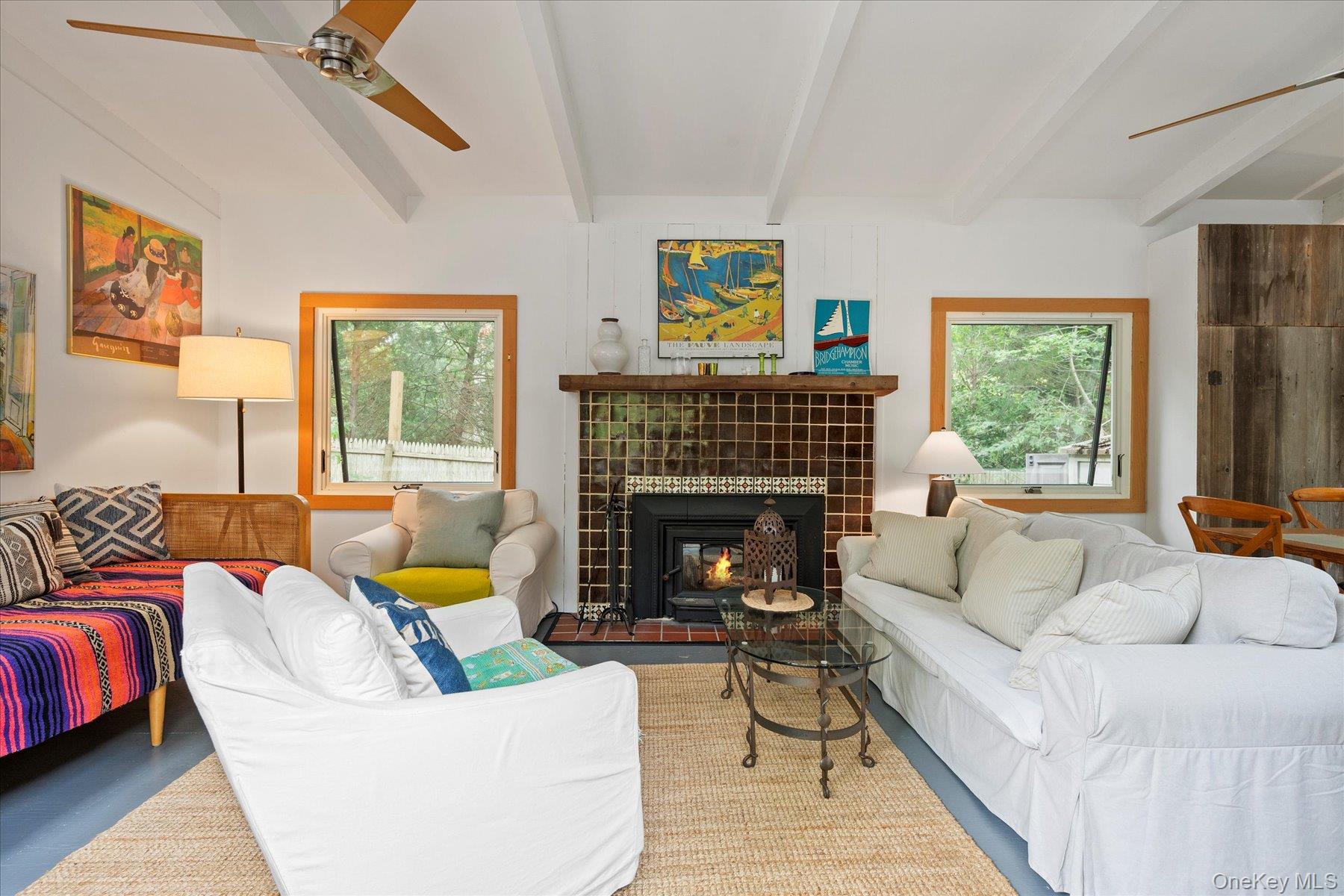 46 Flaggy Hole Road East Hampton, NY 11937 - Photo 6 of 32 a living room with furniture and a fireplace