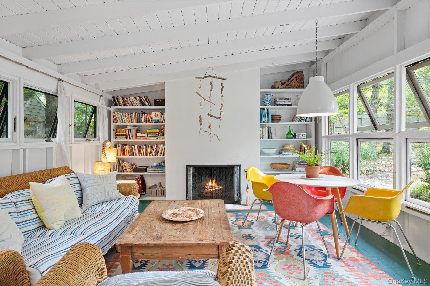 46 Flaggy Hole Road East Hampton, NY 11937 - Photo 8 of 32 a living room with furniture and a fireplace