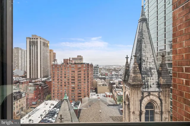 a view of a city with tall buildings