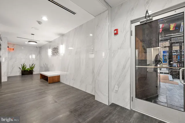a bathroom with a shower and a tub