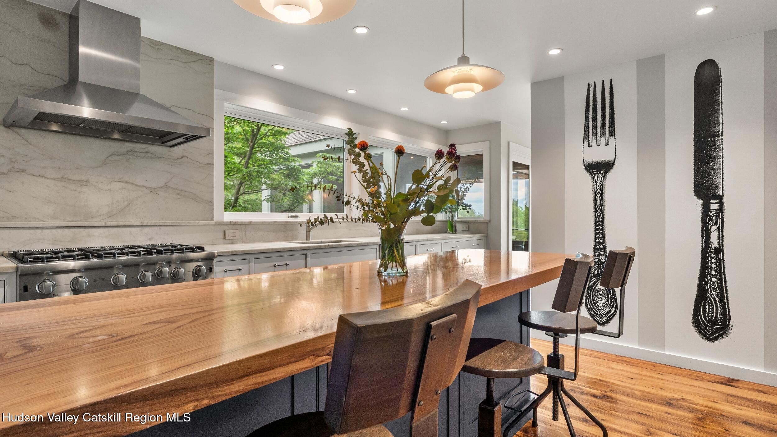 74 Oak Ridge Canaan, NY 12029 - Photo 14 of 54 a kitchen with stainless steel appliances granite countertop a stove a sink and a refrigerator
