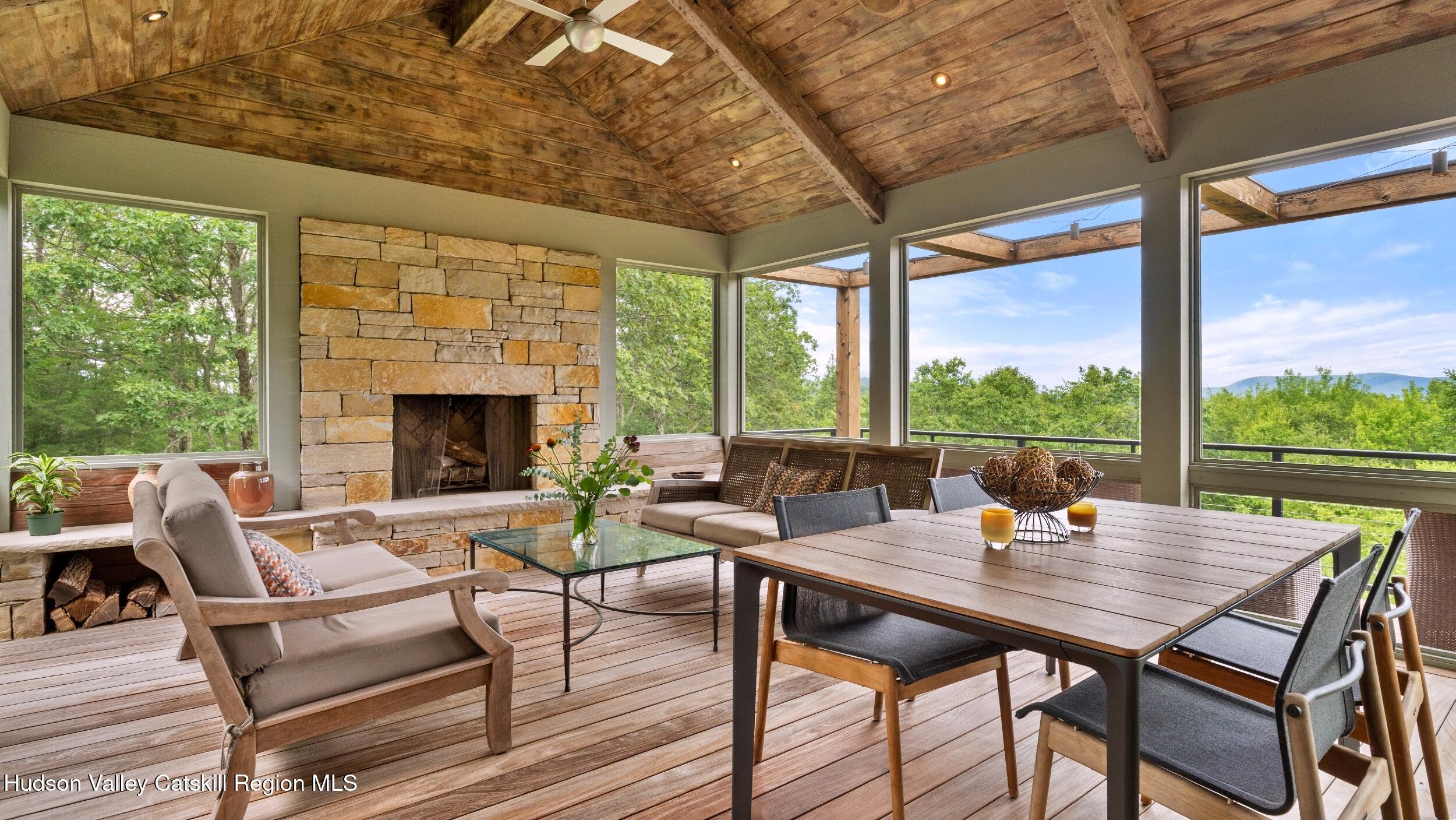 74 Oak Ridge Canaan, NY 12029 - Photo 17 of 54 a outdoor space with patio couch and a fireplace