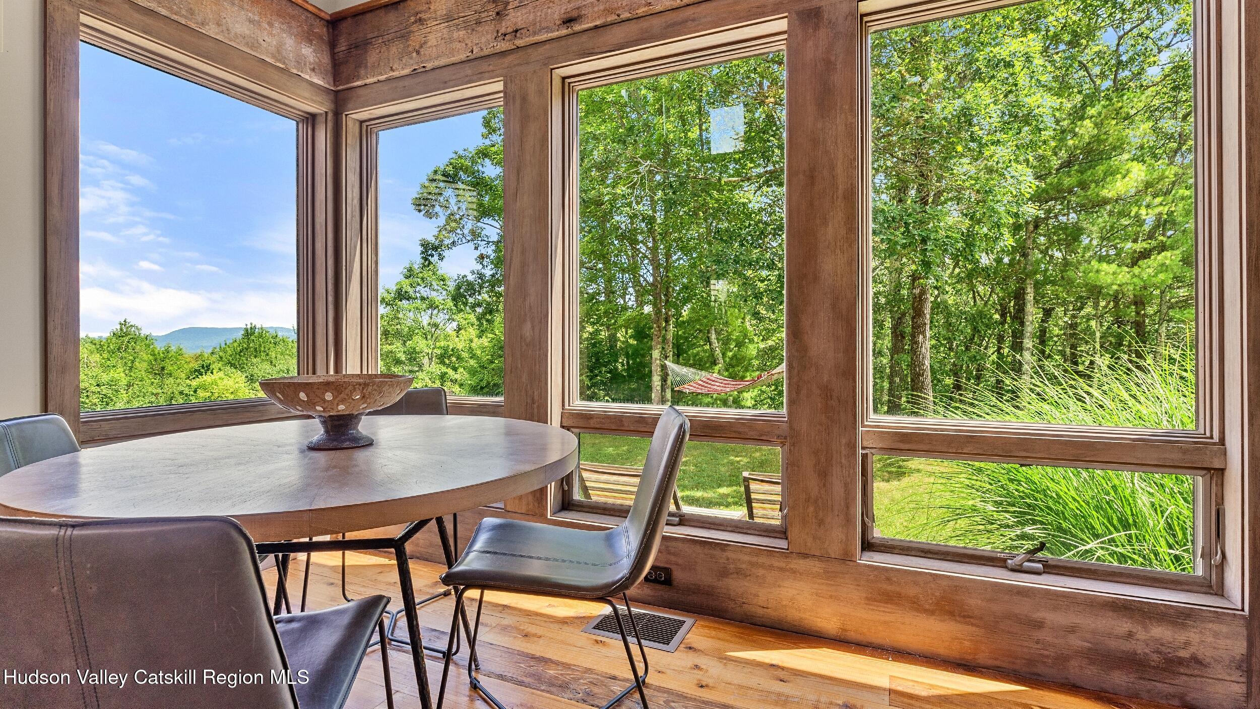 74 Oak Ridge Canaan, NY 12029 - Photo 22 of 54 a view of a dining room with furniture window and outside view