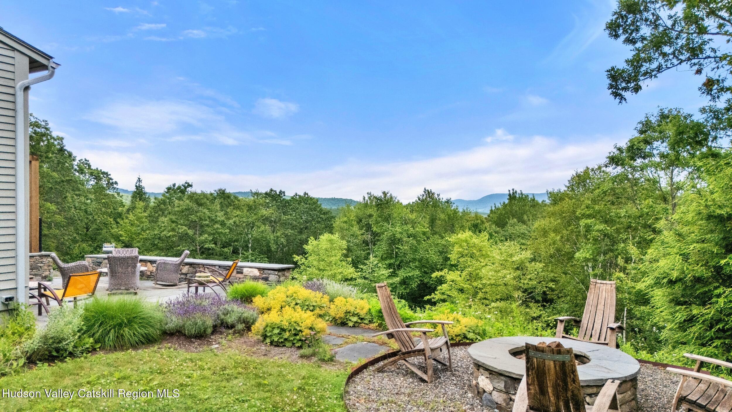 74 Oak Ridge Canaan, NY 12029 - Photo 35 of 54 a view of a garden with an outdoor seating