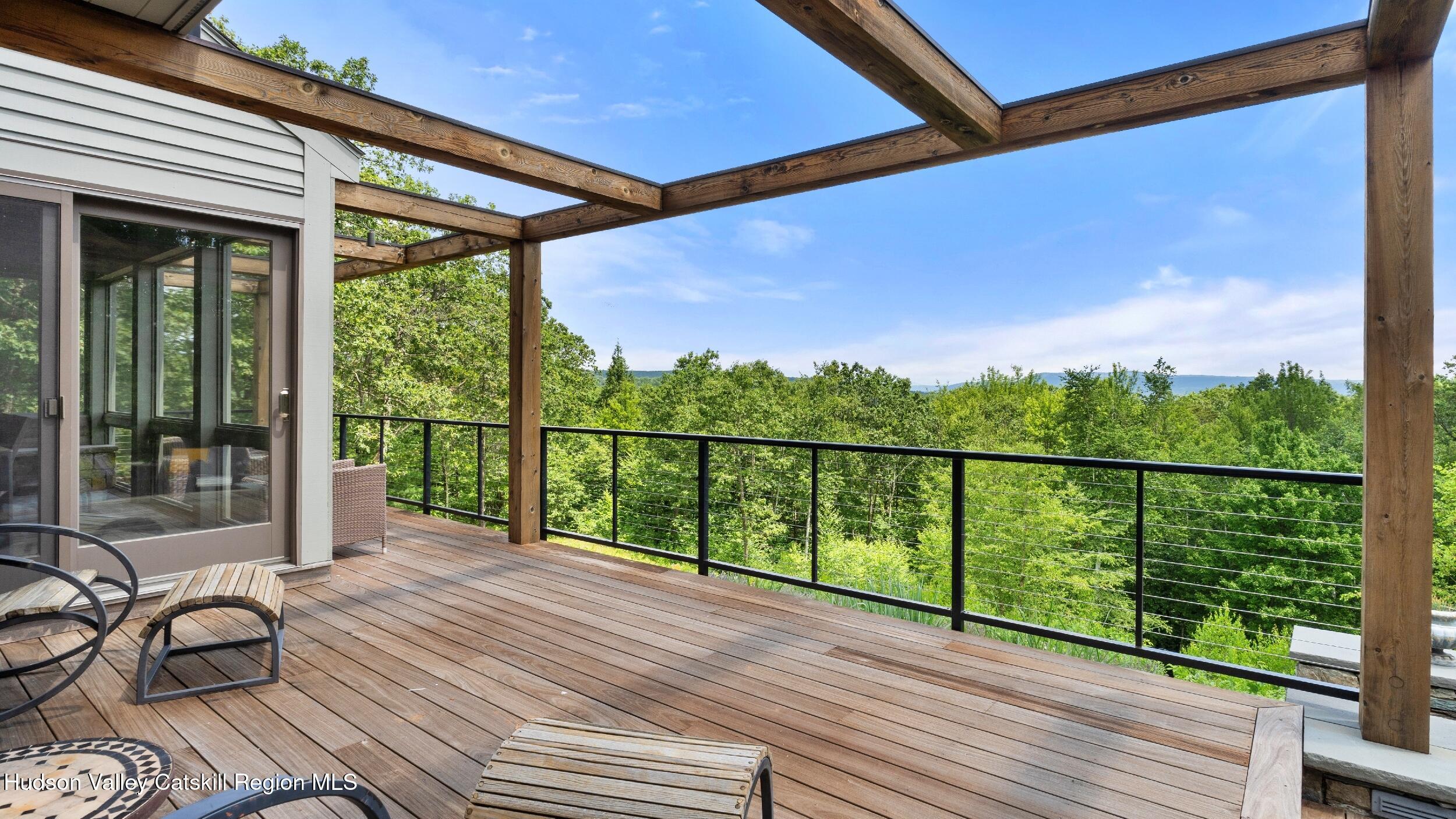 74 Oak Ridge Canaan, NY 12029 - Photo 38 of 54 a view of a balcony with wooden floor