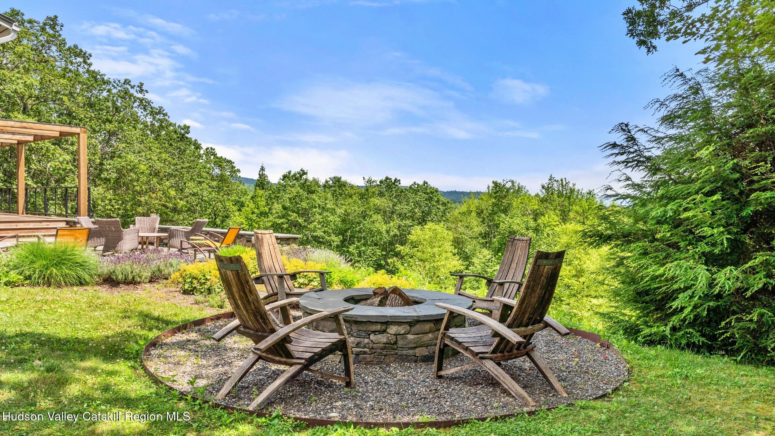 74 Oak Ridge Canaan, NY 12029 - Photo 47 of 54 a view of a chair and table in backyard