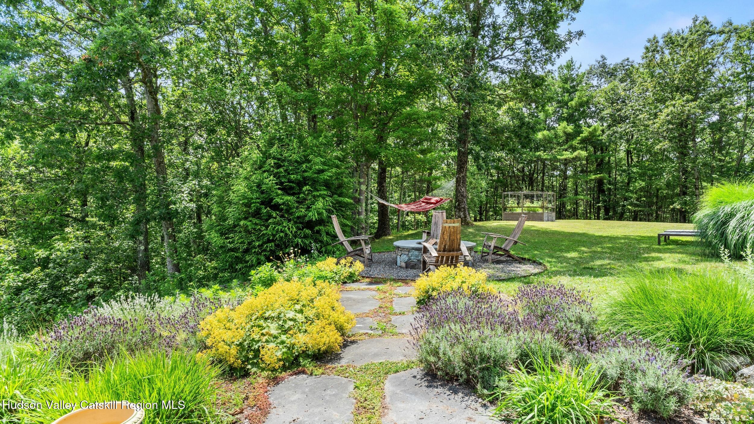 74 Oak Ridge Canaan, NY 12029 - Photo 49 of 54 a view of a garden with large trees