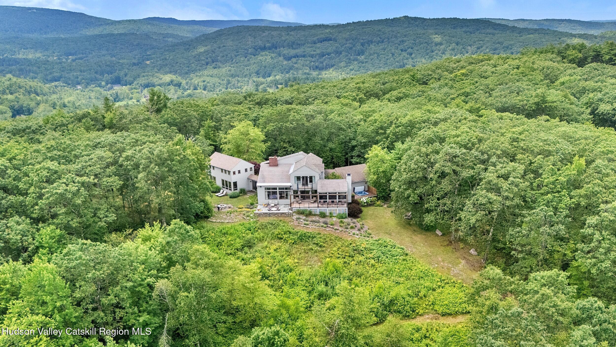 74 Oak Ridge Canaan, NY 12029 - Photo 54 of 54 a view of a house with a mountain in the background