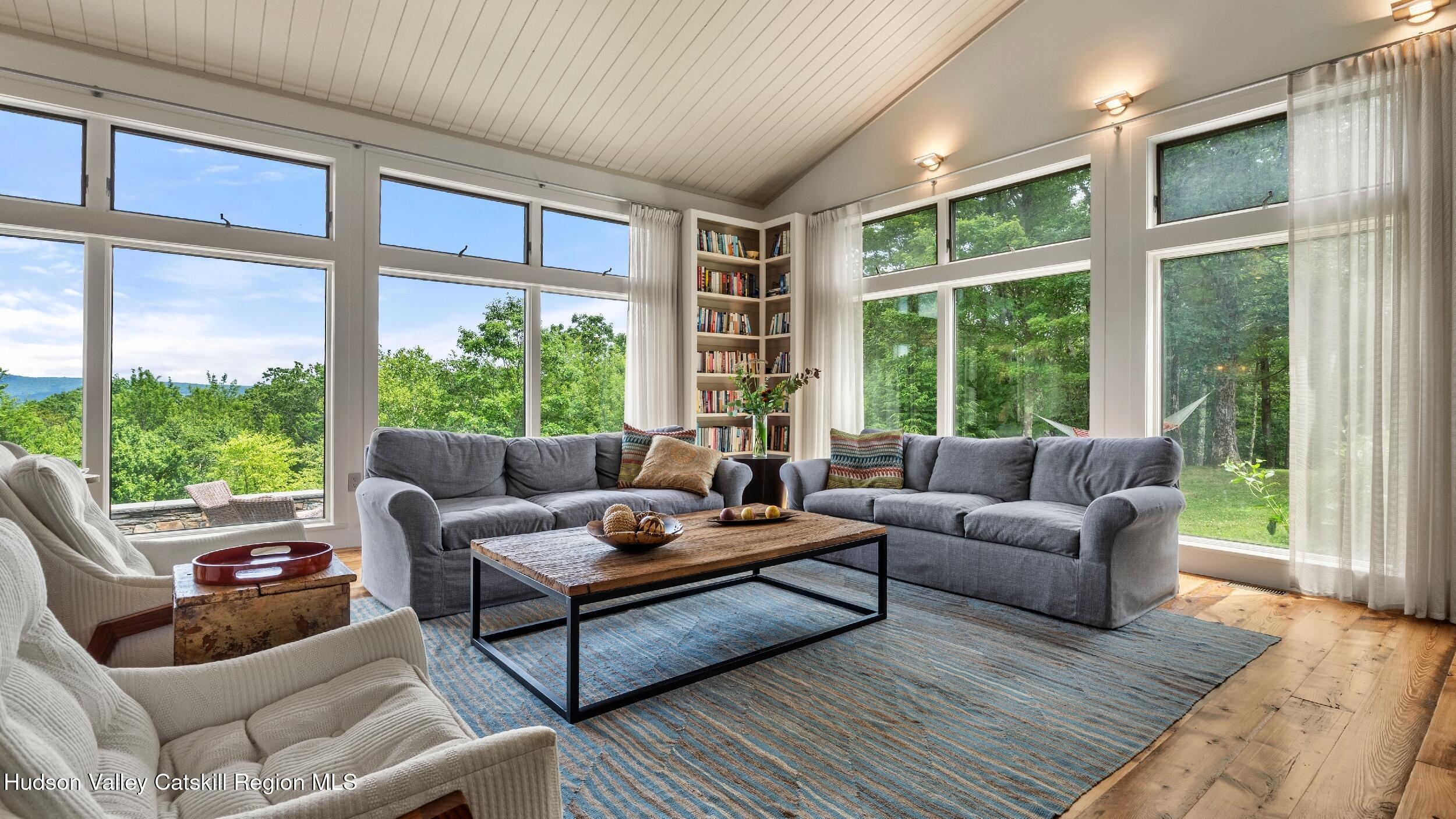 74 Oak Ridge Canaan, NY 12029 - Photo 6 of 54 a living room with furniture and a large window