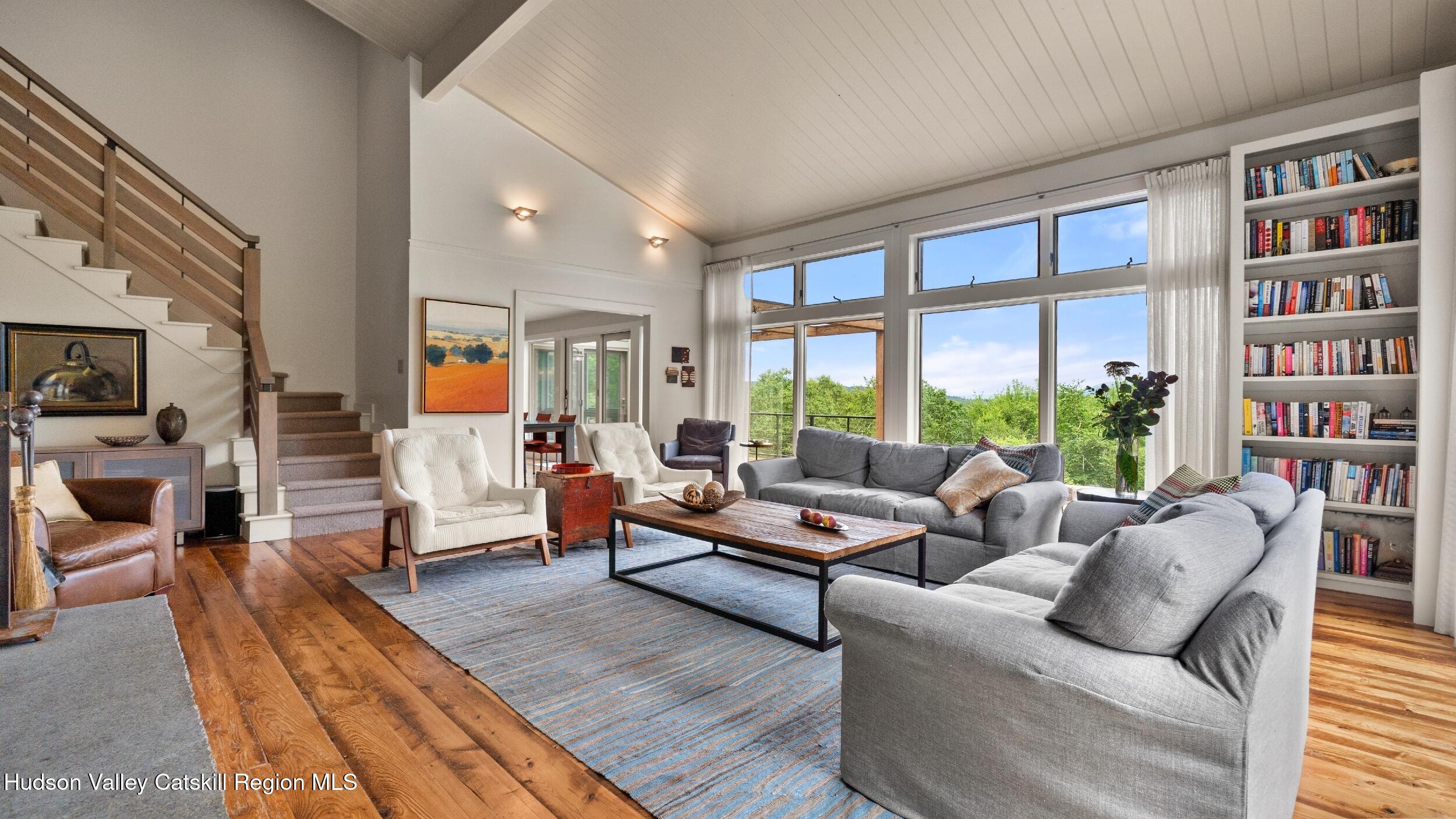 74 Oak Ridge Canaan, NY 12029 - Photo 7 of 54 a living room with furniture fireplace and a large window