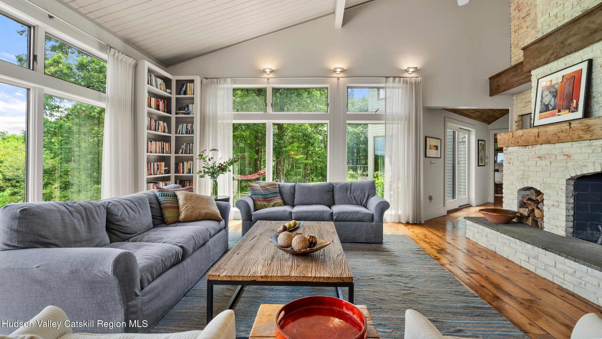 74 Oak Ridge Canaan, NY 12029 - Photo 8 of 54 a living room with furniture and a large window