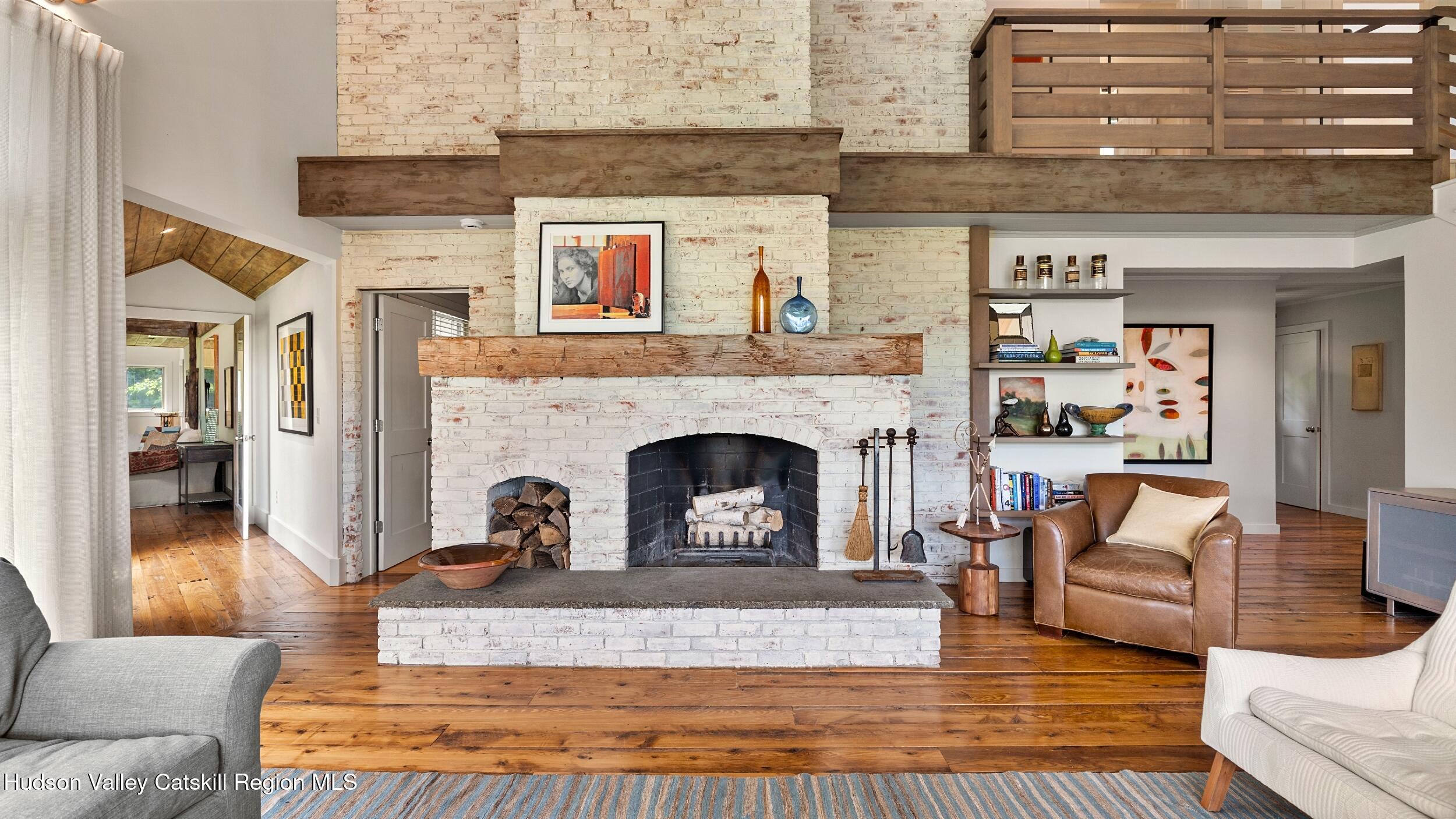 74 Oak Ridge Canaan, NY 12029 - Photo 9 of 54 a view of a livingroom with furniture and a fireplace