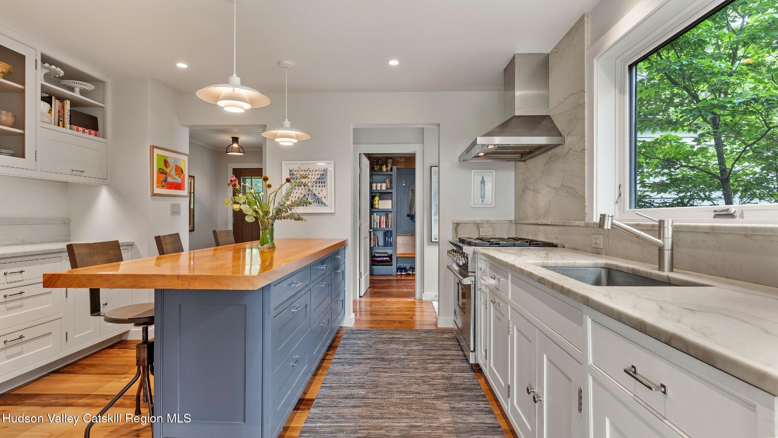 74 Oak Ridge Canaan, NY 12029 - Photo 10 of 54 a kitchen with stainless steel appliances granite countertop a sink and a large window