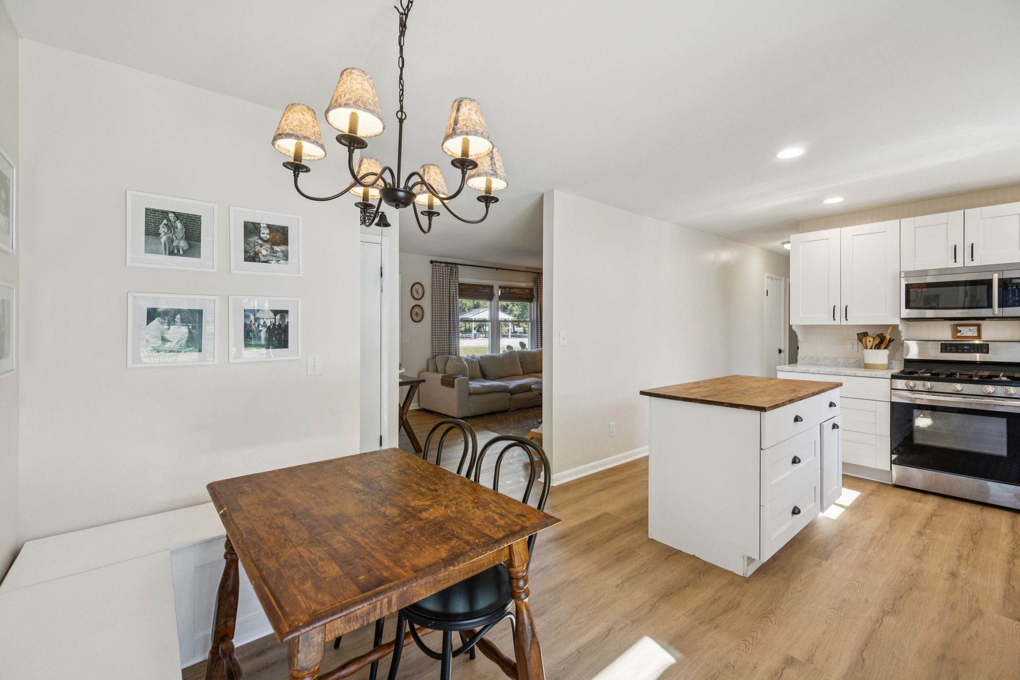 440 West Maple Street Morrison, TN 37357 - Photo 11 of 24 a kitchen with a table chairs and microwave