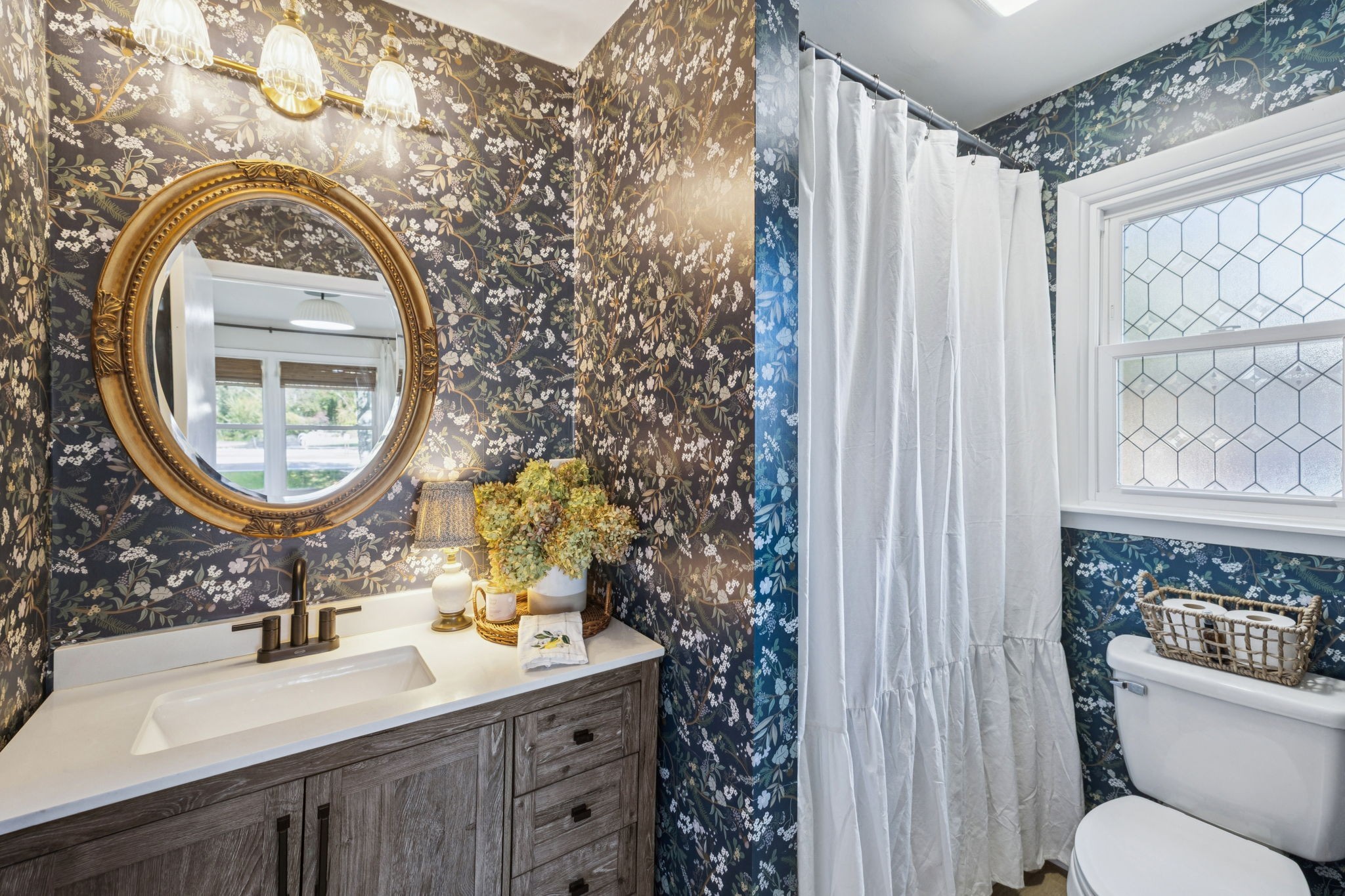 440 West Maple Street Morrison, TN 37357 - Photo 16 of 24 a bathroom with a sink a mirror and a toilet