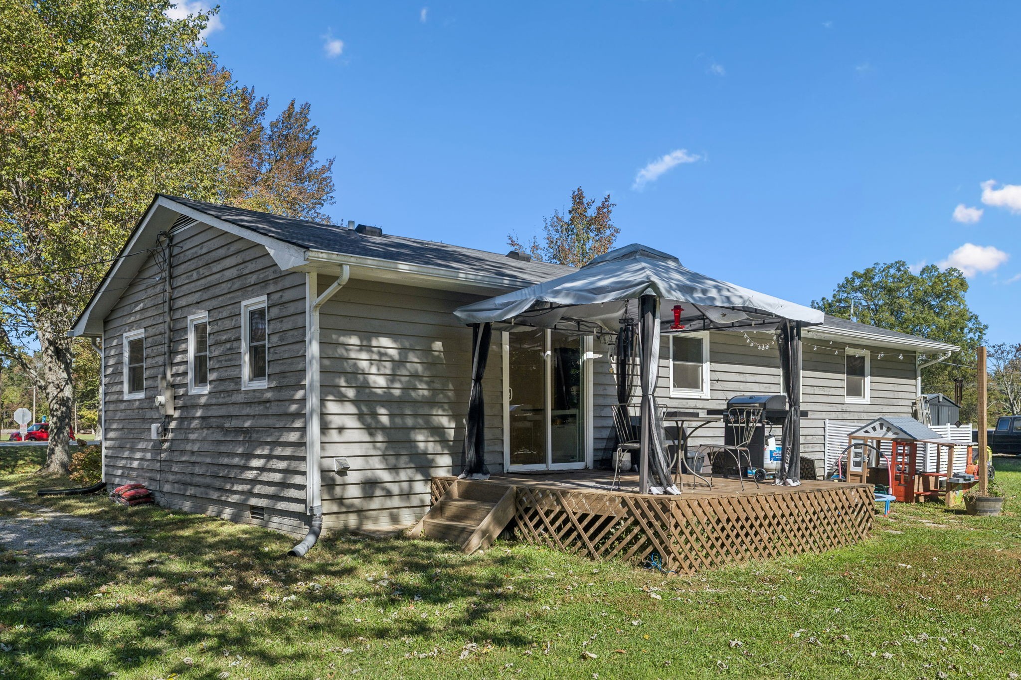 440 West Maple Street Morrison, TN 37357 - Photo 18 of 24 a front view of a house with a yard