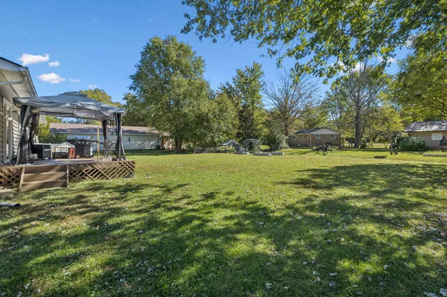 a view of a house with a big yard
