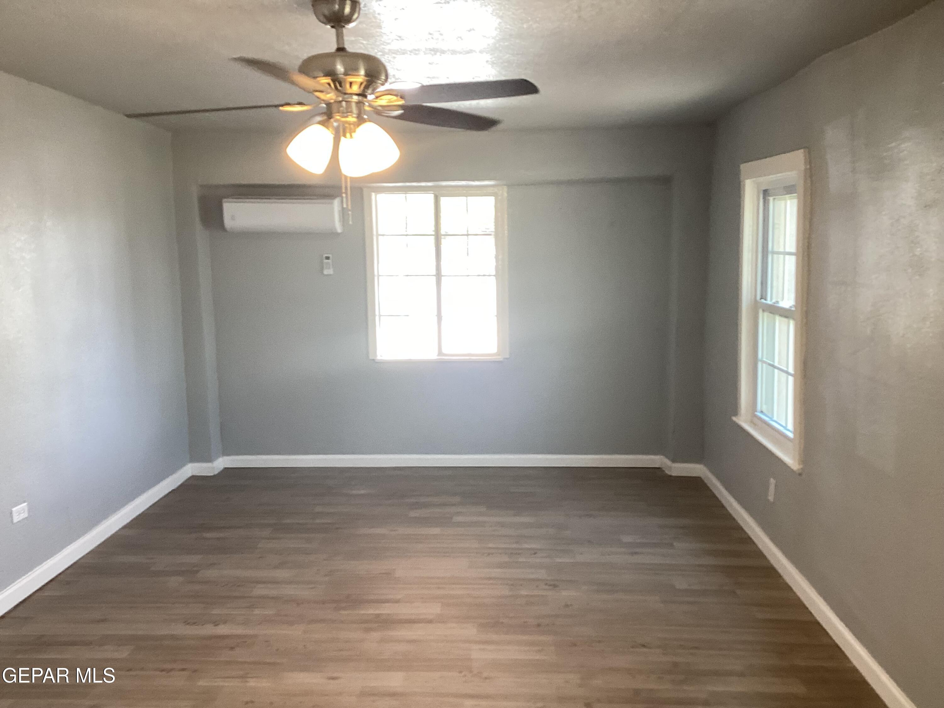 8405 Pinon Street El Paso, TX 79907 - Photo 7 of 21 a view of an empty room with a window
