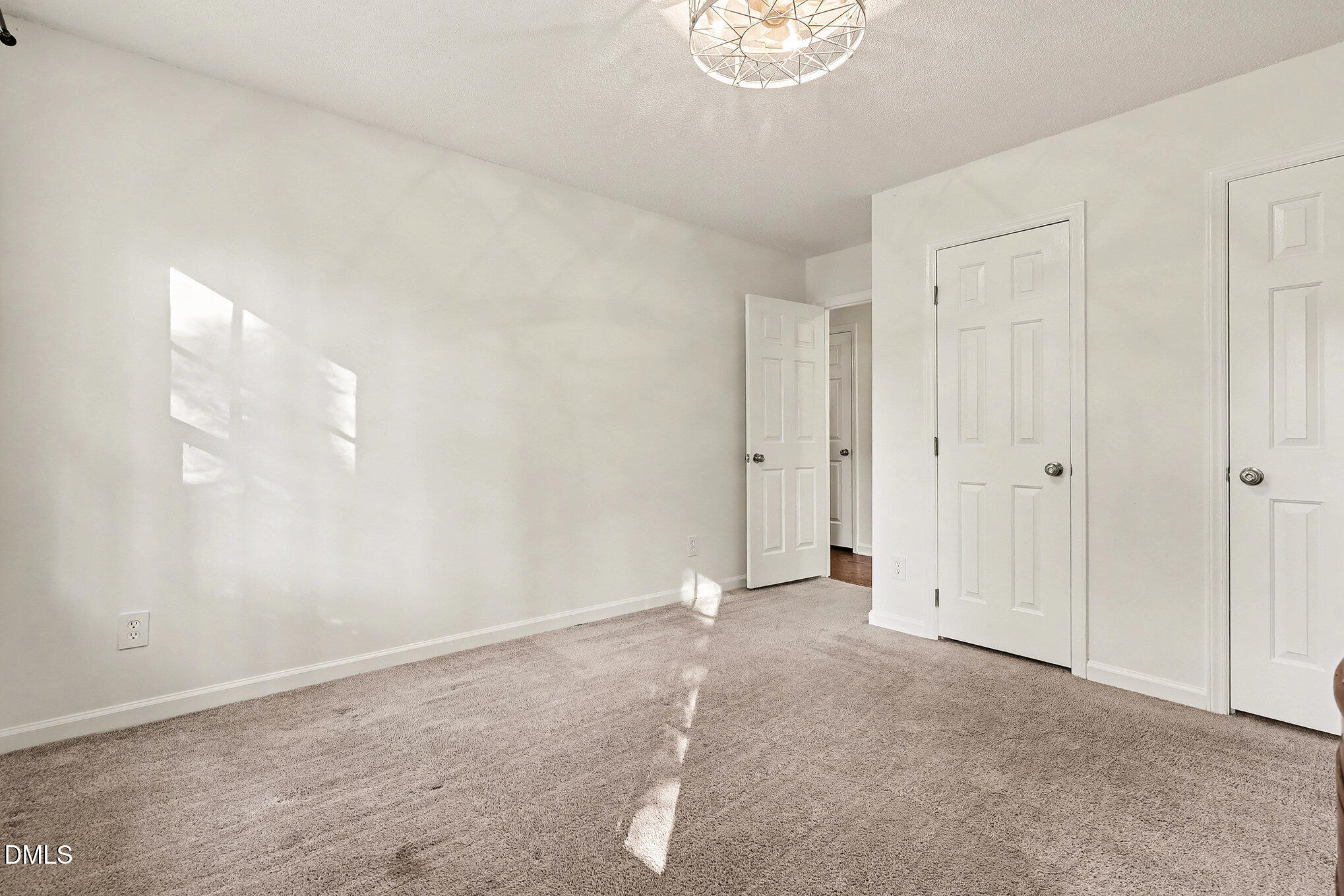 4121 Summer Ridge Court Apex, NC 27539 - Photo 21 of 29 a view of an empty room
