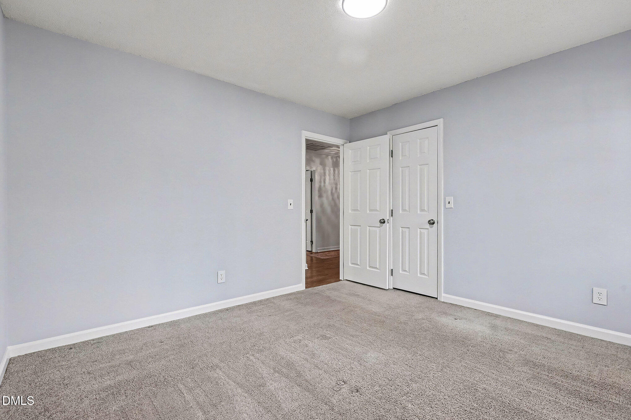 4121 Summer Ridge Court Apex, NC 27539 - Photo 24 of 29 a view of an empty room