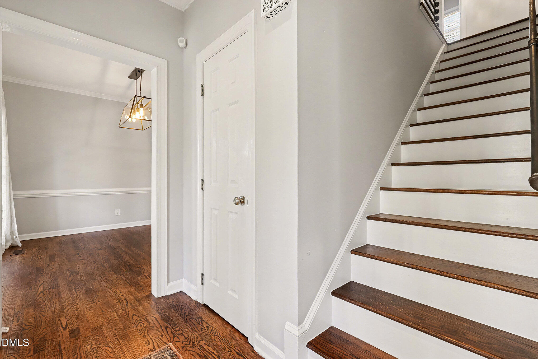 4121 Summer Ridge Court Apex, NC 27539 - Photo 27 of 29 a view of an entryway with wooden floor