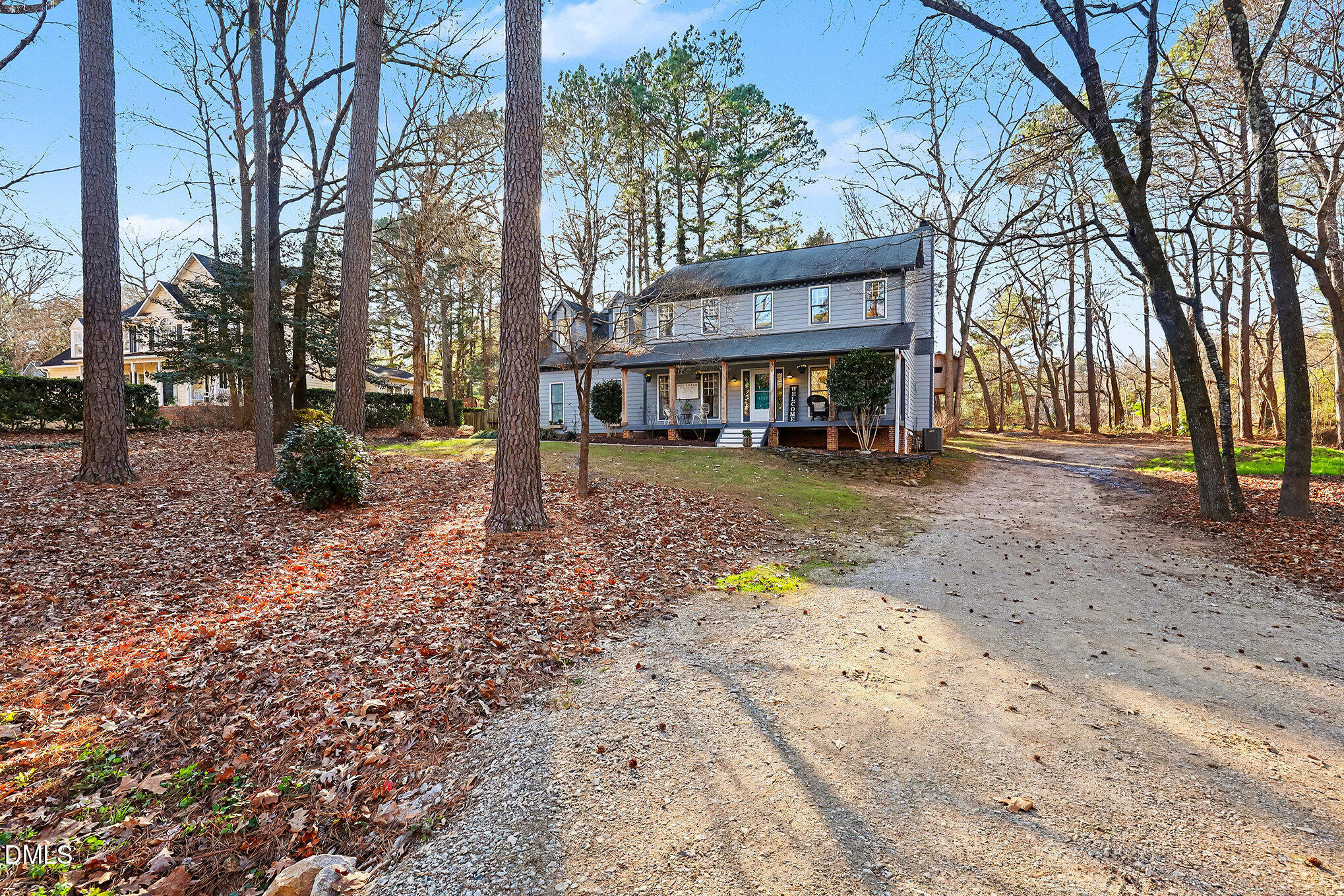 4121 Summer Ridge Court Apex, NC 27539 - Photo 3 of 29 a view of a house with a yard and large tree