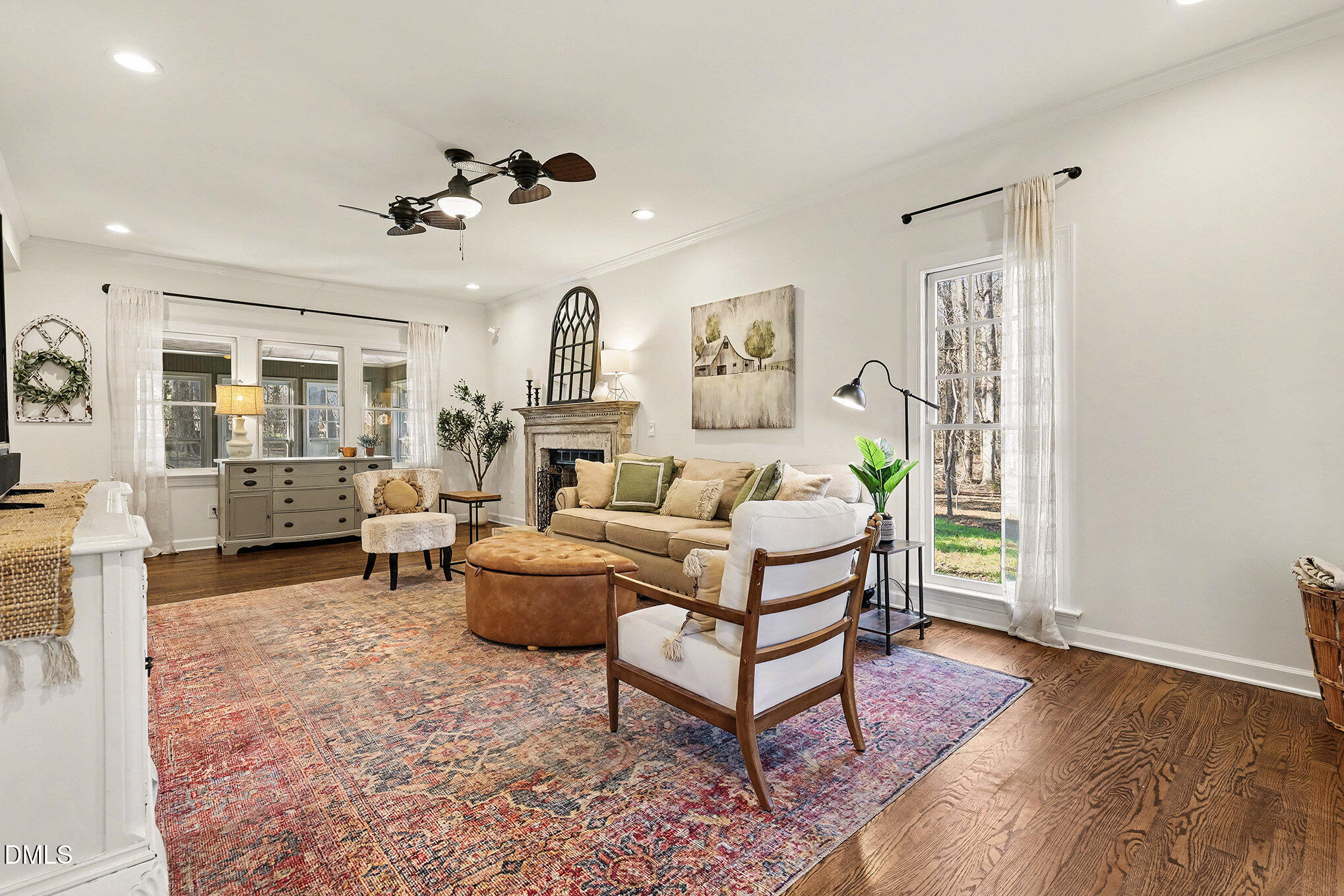 4121 Summer Ridge Court Apex, NC 27539 - Photo 6 of 29 a living room with furniture and a wooden floor