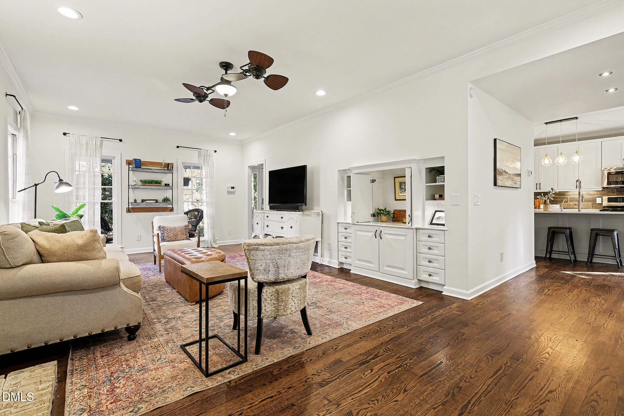 4121 Summer Ridge Court Apex, NC 27539 - Photo 7 of 29 a living room with furniture and wooden floor