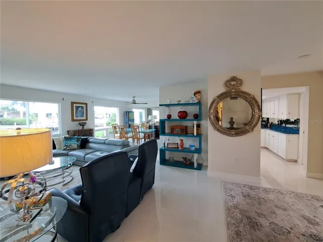 a room with furniture and a mirror