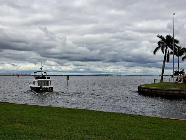 a view of a lake with a big yard