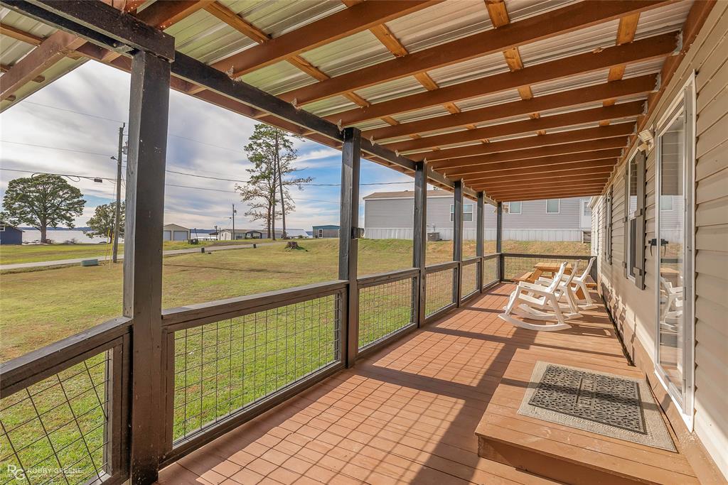 1048 Merritt Mountain Road Many, LA 71449 - Photo 4 of 27 front porch with lake view