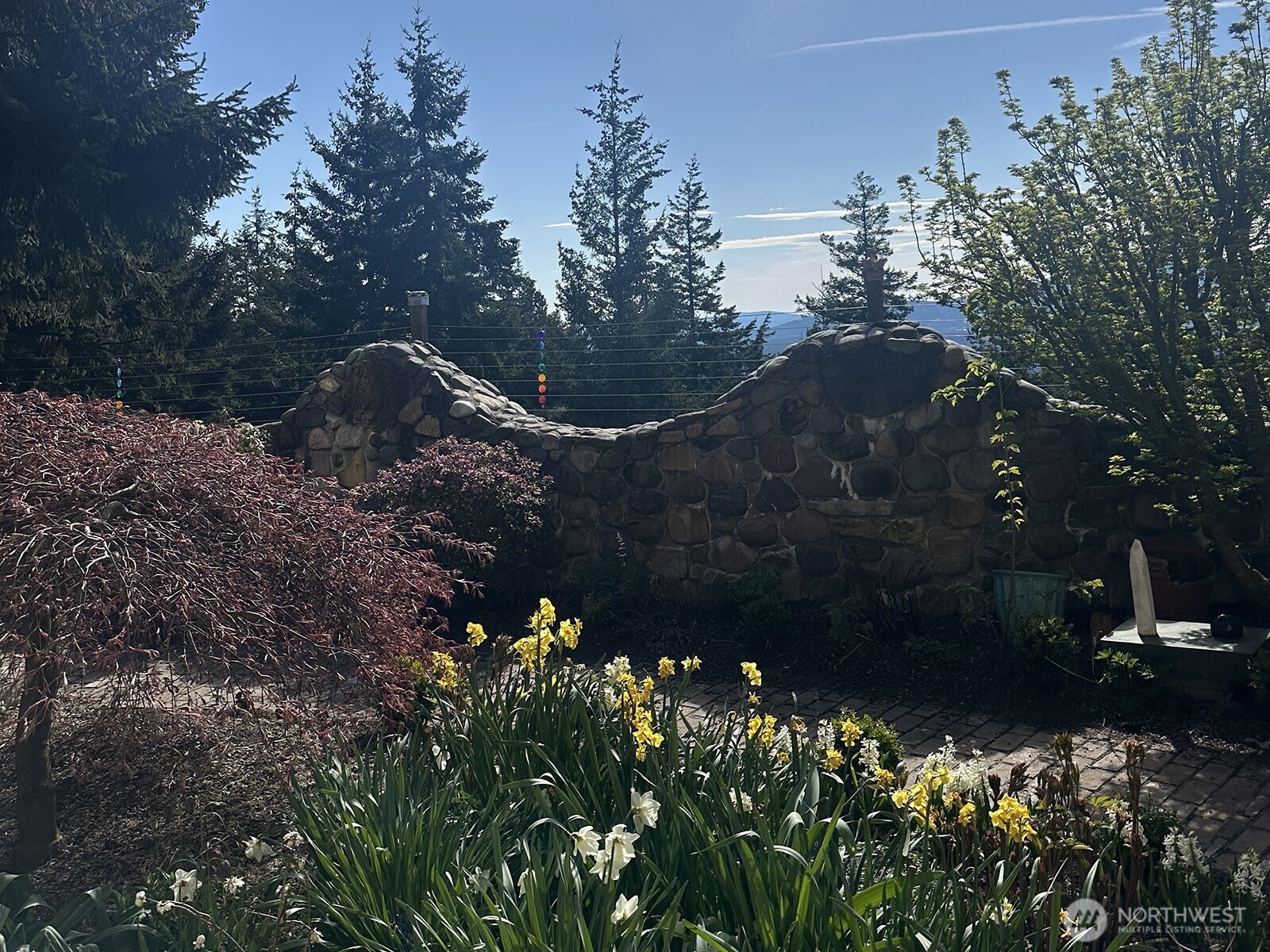 1656 Eagle Ridge Road Orcas Island, WA 98245 - Photo 12 of 40 a view of a street with flower plants and tree