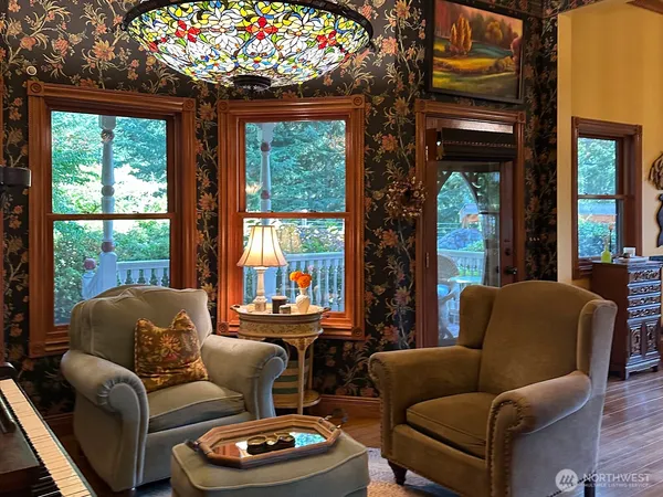 a room with furniture and a large window