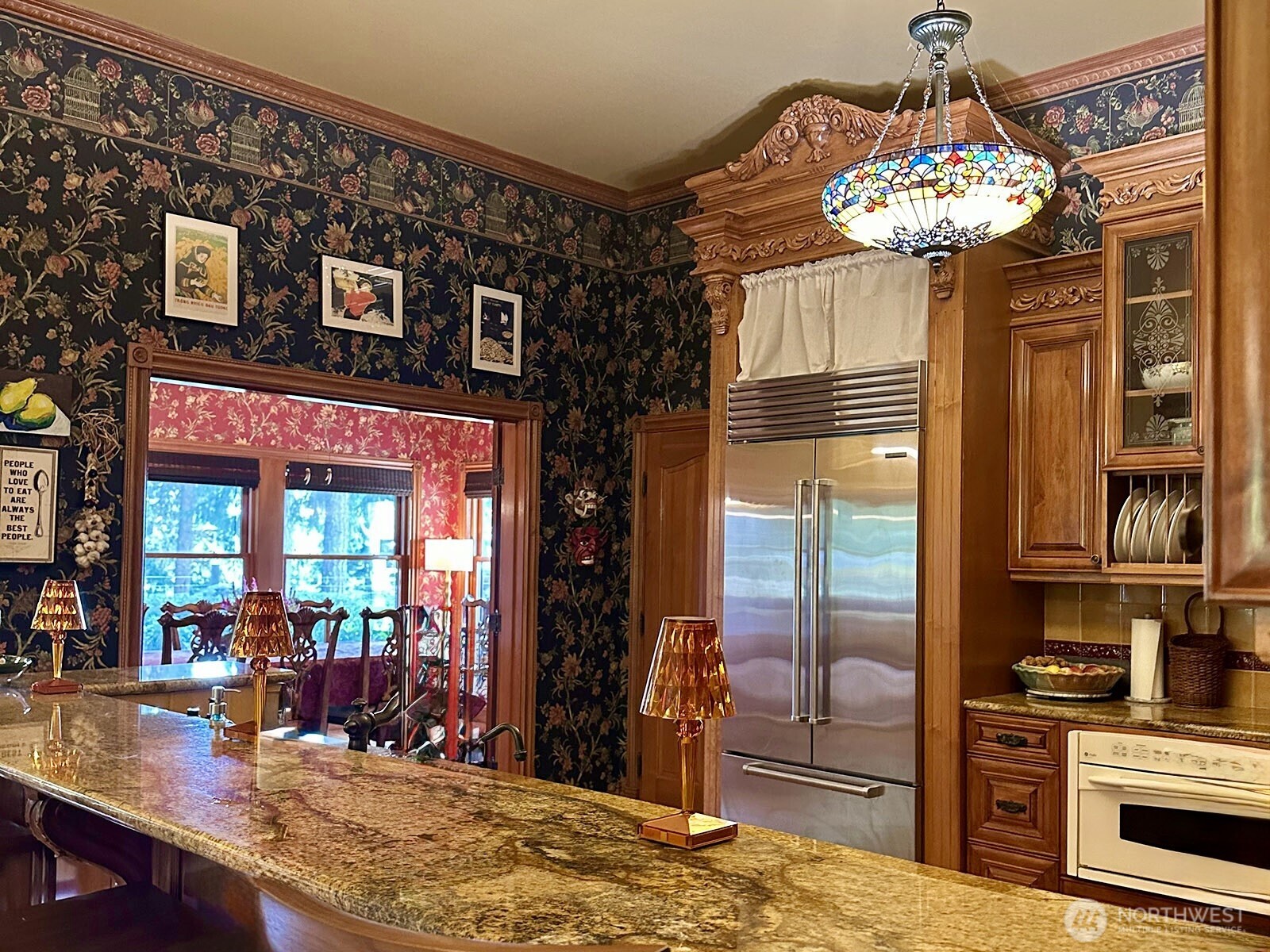 1656 Eagle Ridge Road Orcas Island, WA 98245 - Photo 25 of 40 a living room with fireplace furniture and a chandelier
