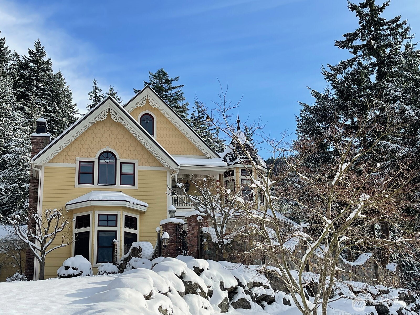 1656 Eagle Ridge Road Orcas Island, WA 98245 - Photo 5 of 40 a front view of a house with a yard