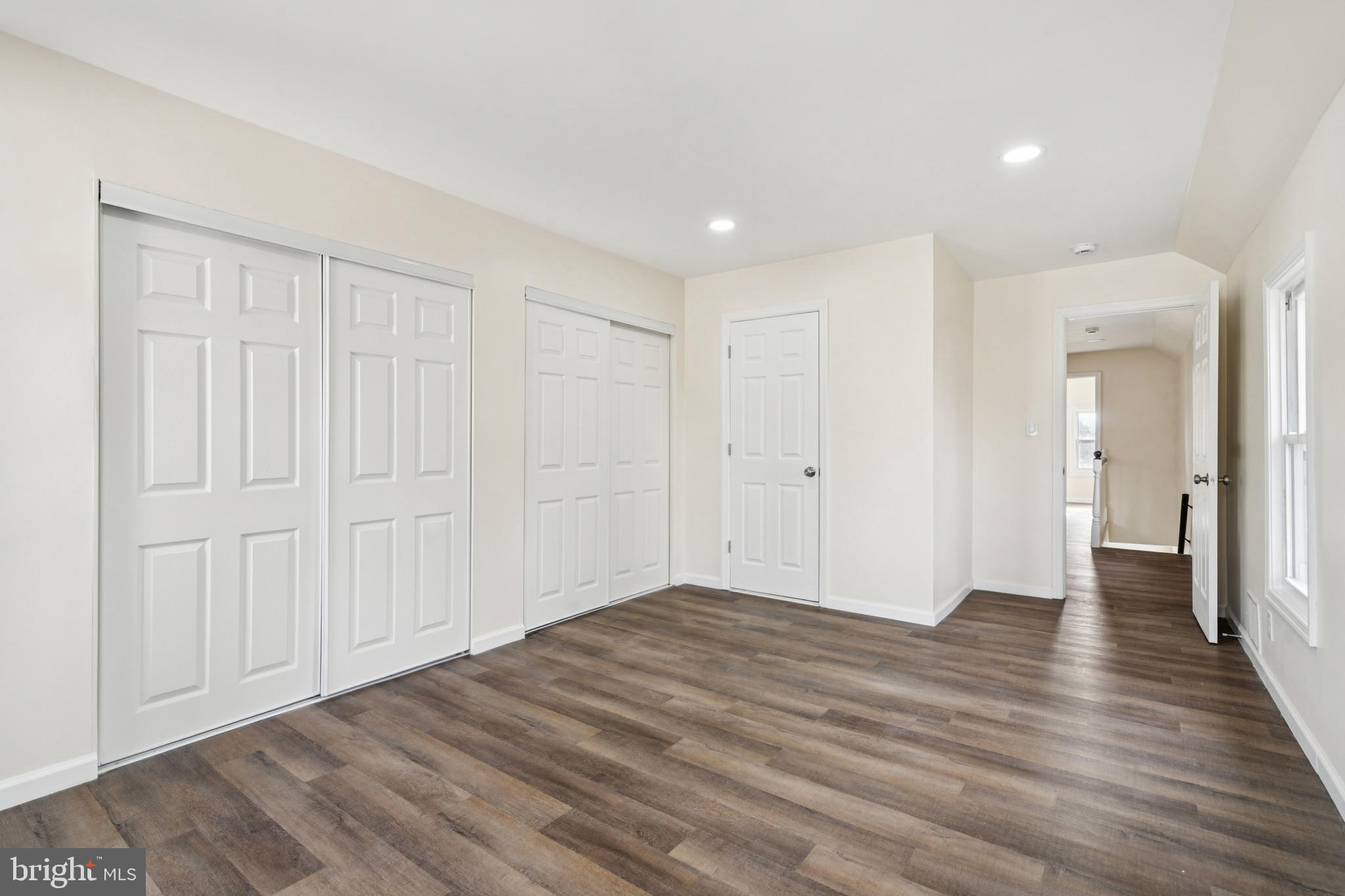 457 Wesley Avenue Pitman, NJ 08071 - Photo 16 of 25 a view of empty room with wooden floor